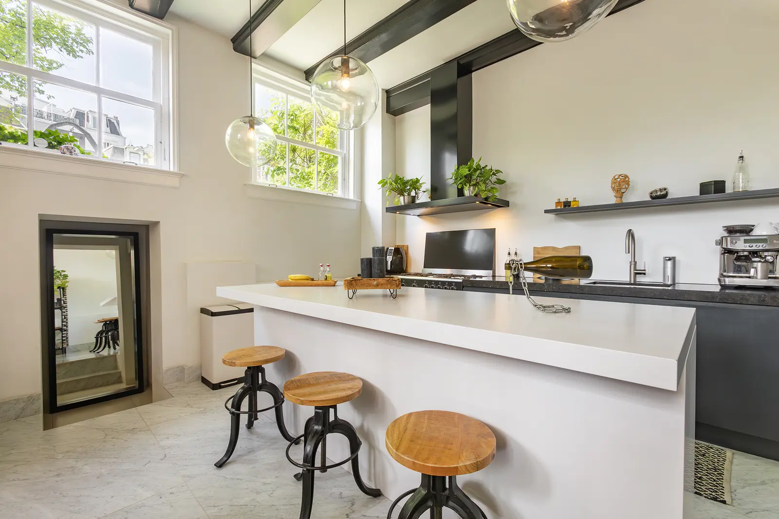 Kitchen beneath exposed timber beams