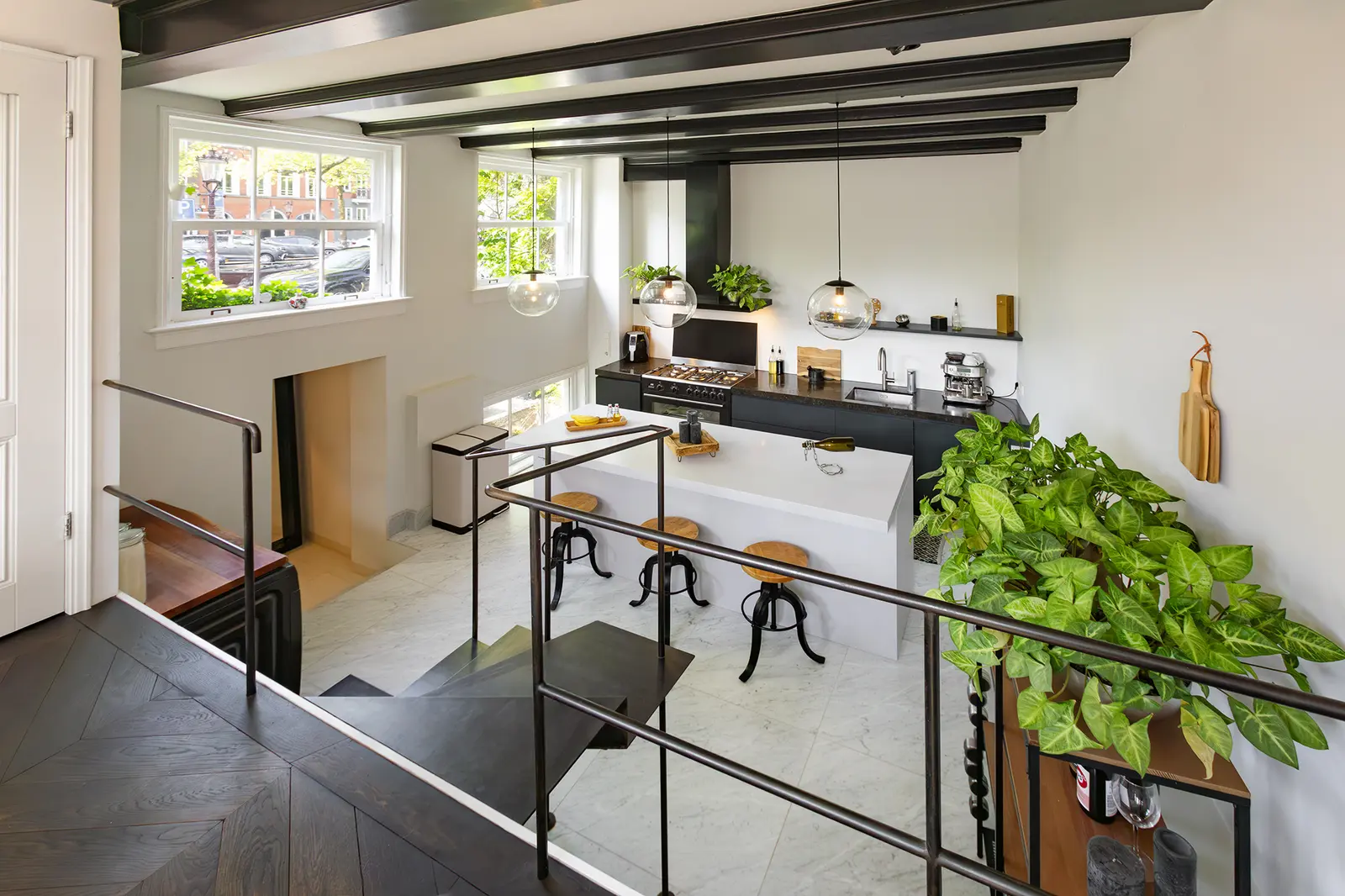 Original staircase and double-height living space