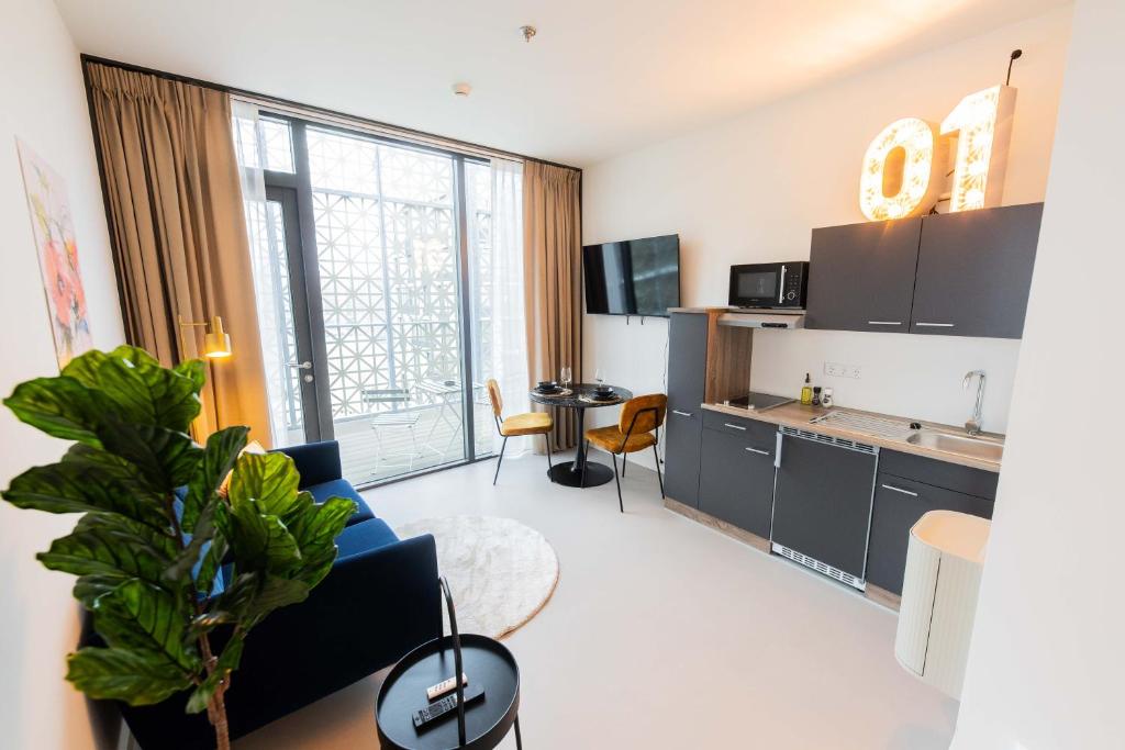 Bright apartment interior with kitchen and balcony at Brede Hilledijk 95